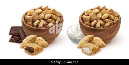 Sweet corn pads with chocolate and milk filling in wooden bowl isolated on white background Stock Photo