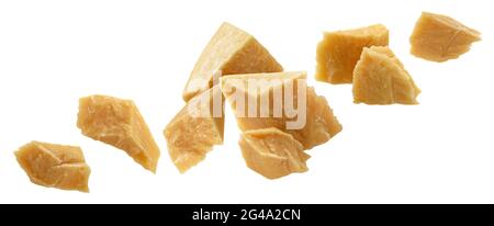 Falling broken pieces of parmesan cheese isolated on white background Stock Photo