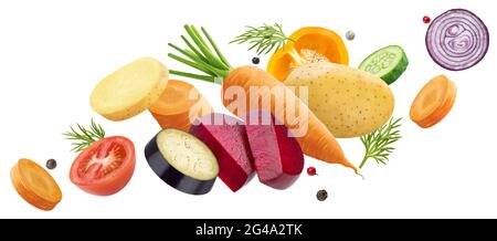 Falling mix of different vegetables isolated on white background Stock Photo