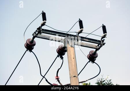 Close up high voltage power lines Stock Photo