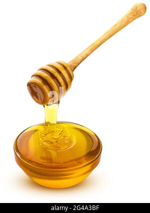Honey dipper and bowl of pouring honey isolated on white background Stock Photo