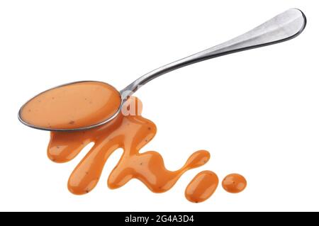 Cocktail sauce with spoon isolated on white background Stock Photo