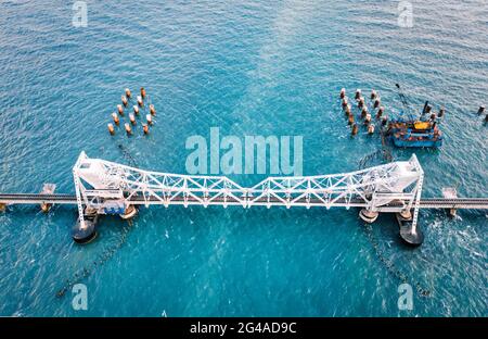 Rameshwaram  harbour  bridge and boats Stock Photo