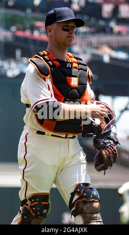 San Francisco Giants catcher Buster Posey hugs pitcher Brian Wilson after  they defeated the Philadelphia Phillies 3-2 in game 6 of the NLSC between  the San Francisco Giants and the Philadelphia Phillies