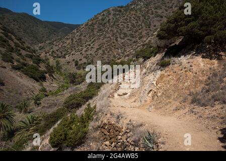 An old camino or pathway leads from La Gomera's Vallehermoso through Barranco de la Era Nueva to 730 meter high Teselinde ridge. Stock Photo