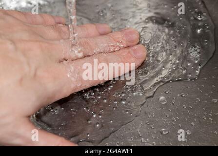 Hygiene - washing hands. Selective focus. Stock Photo