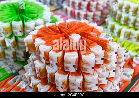 Many enticing sweets on display in a shop at Beijing Railway Station, China Stock Photo