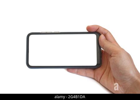 Mockup image, man hand holding black smartphone isolated on white background in horizontal position, blank white screen for mockup. Stock Photo