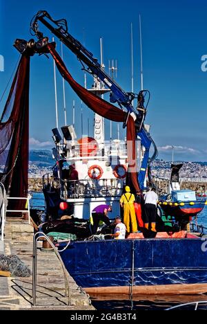 Cangas de Morrazo, Pontevedra, Spain. 12th Aug, 2013.  Fishing boat at work in the port Stock Photo