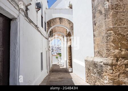 Arch in a typical street of the town of Vejer de la Frontera in Cadiz, Andalusia, Spain, Stock Photo