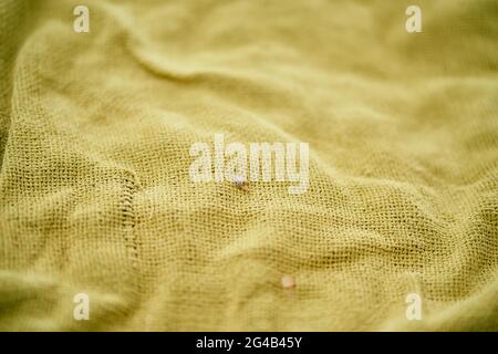 Green woven burlap blanket close-up Stock Photo