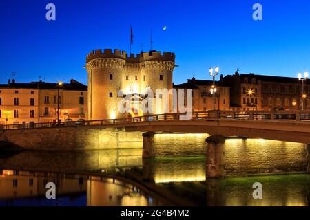 The medieval Gothic Chaussee Gate aka Chaussee Tower (1380) at dusk in Verdun, France Stock Photo