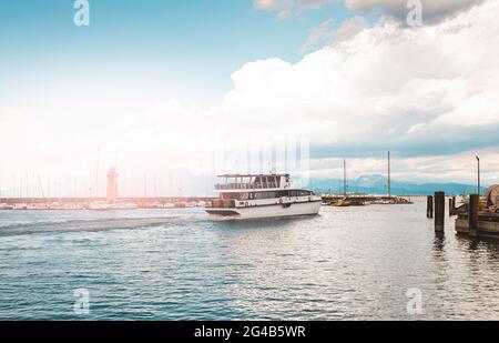 view of a pretty little harbor of a lake in the mountains in spring. concept of sites in wonderful italy Stock Photo