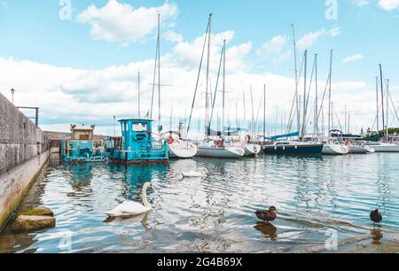view of a pretty little harbor of a lake in the mountains in spring. concept of sites in wonderful italy Stock Photo