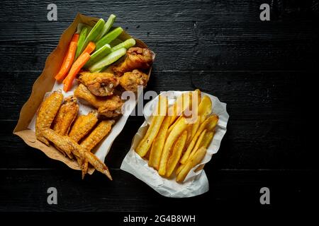 Fried chicken and French fries in paper box packing Stock Photo