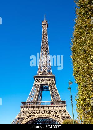 PARIS - SEPTEMBER 28: Eiffel tower is landmark of Paris, France under sunny blue sky, was taken on September 28, 2105. Stock Photo