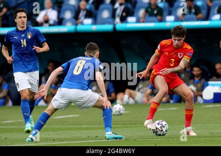 ROME, ITALY - JUNE 20: Neco Williams of Wales competes for the ball with Jorginho of Italy ,during the UEFA Euro 2020 Championship Group A match between Italy and Wales at Stadio Olimpico on June 20, 2021 in Rome, Italy. (Photo by MB Media/BPA) Stock Photo