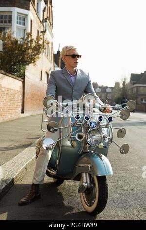 GREAT BRITAIN / England / London /Young mod on vespa scooter in London. Stock Photo