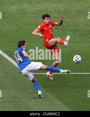 Rome, Italy, 20th June 2021.  Federico Chiesa of Italy and Neco Williams of Wales during the UEFA European Championships match at Stadio Olimpico, Rome. Picture credit should read: Jonathan Moscrop / Sportimage Stock Photo