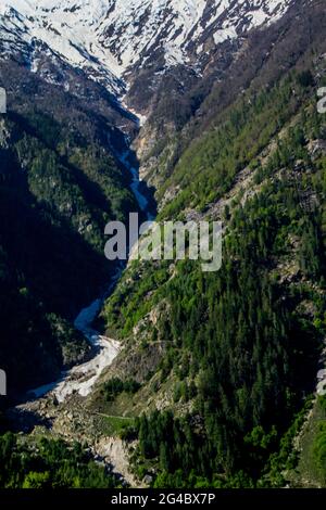 A hazy sunset in Sangla valley Stock Photo