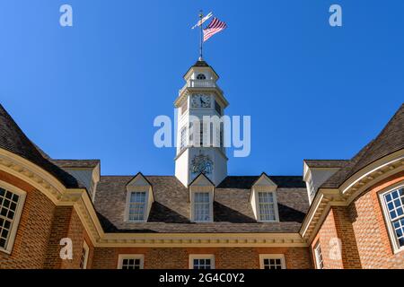 Capitol Building - A replica Grand Union Flag, the first national flag of USA, flying at top of bell tower of Capitol Building in Williamsburg, VA, US. Stock Photo