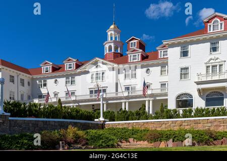 Stanley Hotel -  A closeup wide-angle front-side view of the famous Stanley Hotel on a bright sunny Autumn day in Estes Park, Colorado, USA. Stock Photo