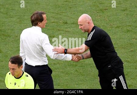 Italy manager Roberto Mancini greets Wales caretaker manager Rob Page after the final whistle during the UEFA Euro 2020 Group A match at the Stadio Olimpico, Rome. Picture date: Sunday June 20, 2021. Stock Photo