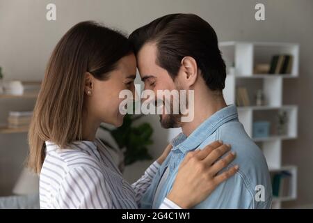 Happy loving married family couple enjoying romantic moment together. Stock Photo