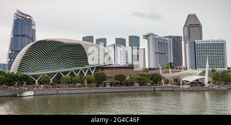 View of the Esplanade - Theatres on the Bay, Singapore with city skyline from Marina Bay Stock Photo