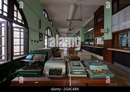 Ancient post office with old telex machines in Yangon, Myanmar Stock Photo