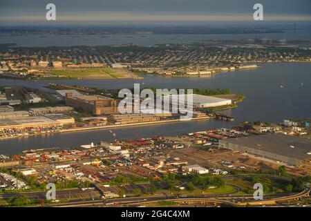 NEWARK, NJ -12 JUN 2021- Aerial view of colorful shipping containers stacked on the docks at the Port Newark Elizabeth in New Jersey, United States. Stock Photo