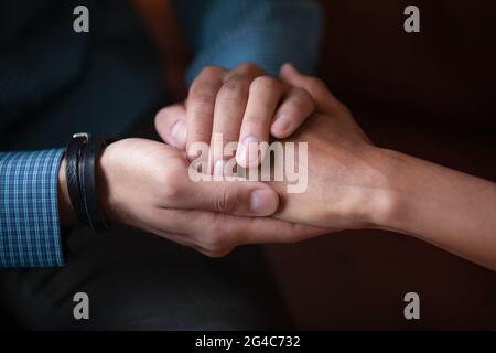 Close up sincere empathic young african man supporting wife. Stock Photo