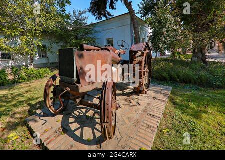 Old tractor from Soviet era in Samarkand, Uzbekistan Stock Photo