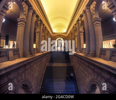 Interior of the Metropolitan Museum of Art with columns and stairs ...