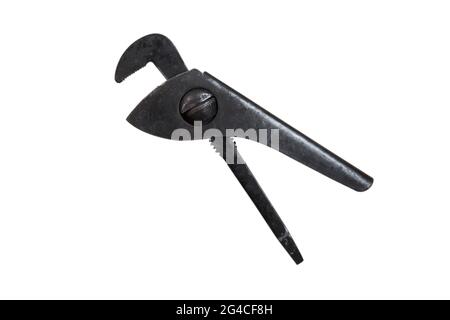 Old adjustable pipe wrench isolated on a white background. Plumbing wrench. Renovation concept. Stock Photo