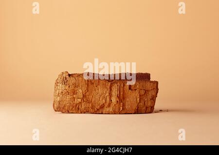 piece of old wood on orange background Stock Photo