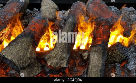 A closeup of flames from a wood fire Stock Photo