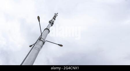 5g station reciever, modern city telecommunication agains the sky Stock Photo