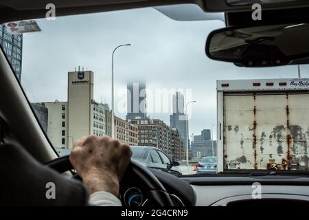 Driving through Chicago on Interstate 90 and a view of the Sears Tower in the fog. Stock Photo