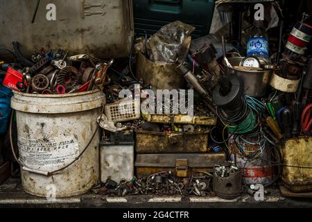 Spare parts and supplies in the workshop of an outboard motor mechanic, Sai Kung, New Territories, Hong Kong Stock Photo
