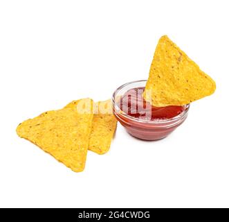Triangle mexican corn nachos with ketchup in the bowl isolated on white background. Stock Photo