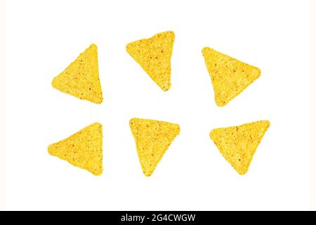 Salty crunchy and crispy triangle mexican corn nachos isolated on white background. Stock Photo
