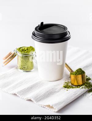 Take away cup of matcha tea on white background Stock Photo