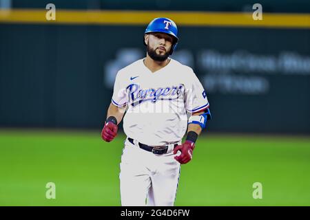 June 19th, 2021: Texas Rangers third baseman Isiah Kiner-Falefa (9) hits a two run homer.during a game between the Minnesota Twins and the Texas Rangers at Globe Life Field in Arlington, Texas.Manny Flores/Cal Sport Media Stock Photo