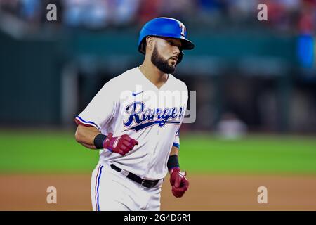 June 19th, 2021: Texas Rangers third baseman Isiah Kiner-Falefa (9) hits a two run homer.during a game between the Minnesota Twins and the Texas Rangers at Globe Life Field in Arlington, Texas.Manny Flores/Cal Sport Media Stock Photo