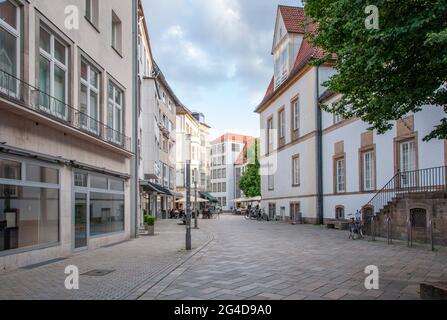 BIELEFELD, GERMANY. JUNE 12, 2021. Beautiful view of small german town with typical architecture. Restaurants on the street. Stock Photo