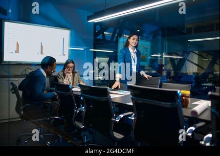 Three managers working in night office Stock Photo
