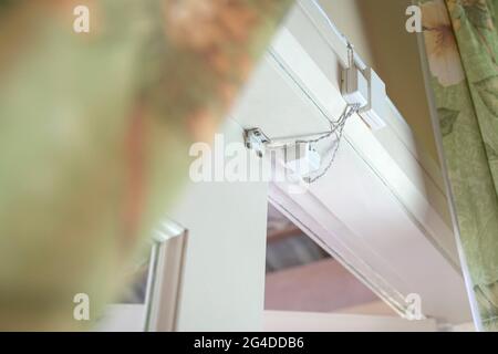 Magnetic alarm sensor installed on door. Home security concept. Stock Photo