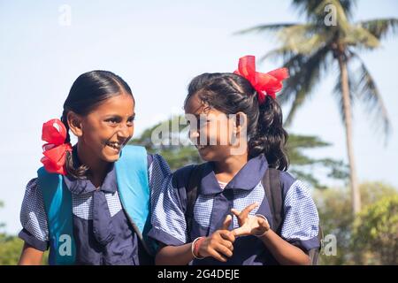 portrait of a rural school girls Smiling and standing in outdoor Stock Photo