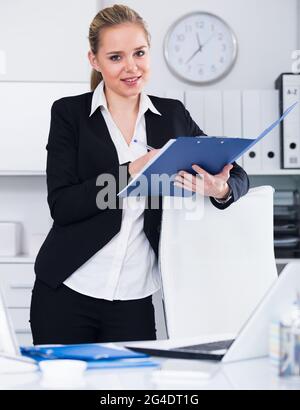Secretary Writing Notes Secretary writing instructions Stock Photo - Alamy